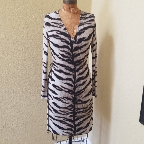 Michael Kors Dresses & Skirts - NWOT MICHAEL KORS ANIMAL PRINT WRAP DRESS SIZE S Michael Kors Dresses & Skirts - NWOT MICHAEL KORS ANIMAL PRINT WRAP DRESS SIZE S